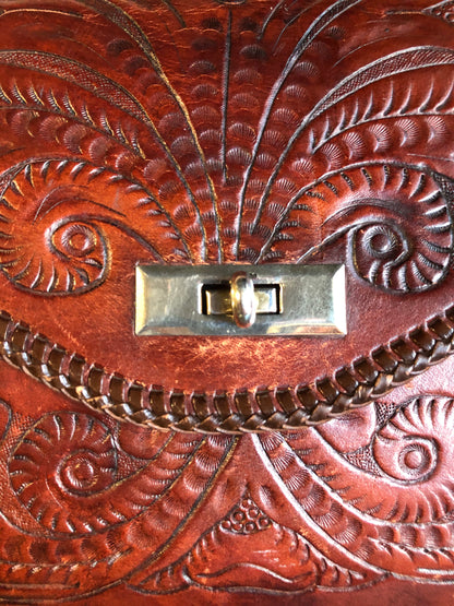 Kingspier Vintage - Hand tooled brown leather purse with leather stitching around the trim and a red leather flower motif lining.