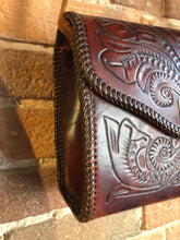 Load image into Gallery viewer, Kingspier Vintage - Hand tooled brown leather purse with leather stitching around the trim and a red leather flower motif lining.
