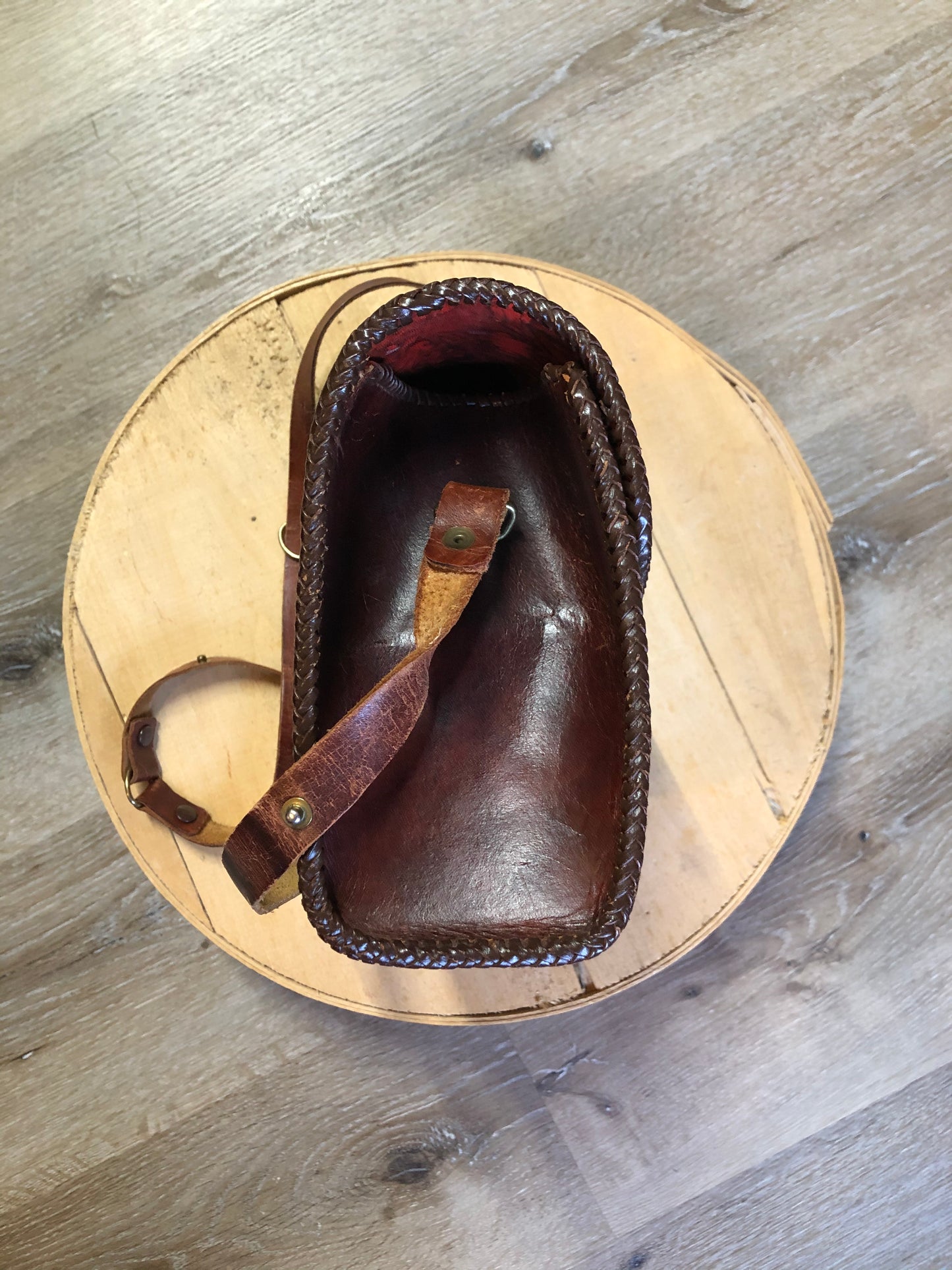 Kingspier Vintage - Hand tooled brown leather purse with leather stitching around the trim and a red leather flower motif lining.