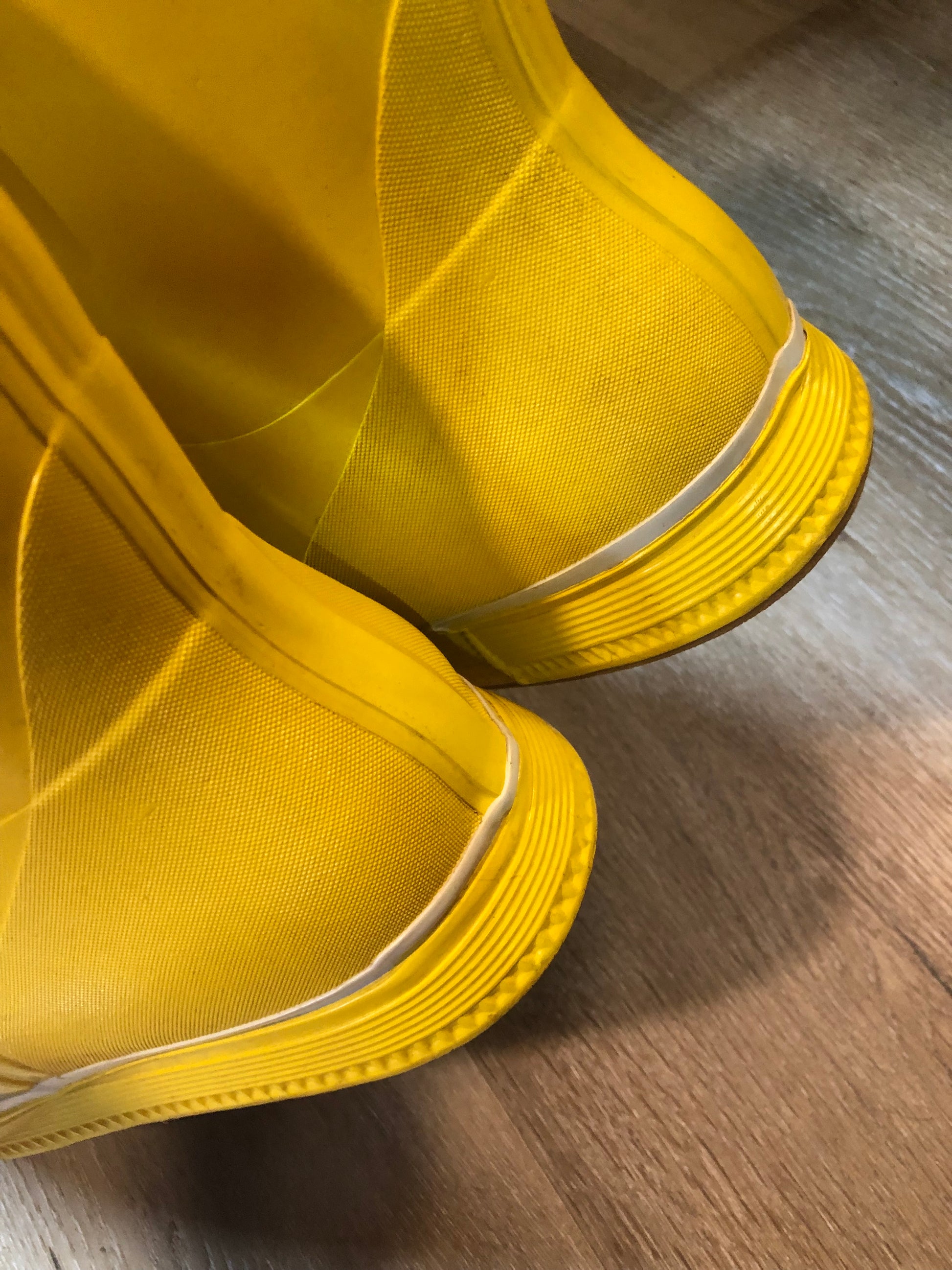 Original Nokia yellow and white rubber sailing boots circa 1980’s are handmade in Finland by the same company that makes cell phones. Nokia no longer makes boots.  Size 13M /15W US, 46 EUR