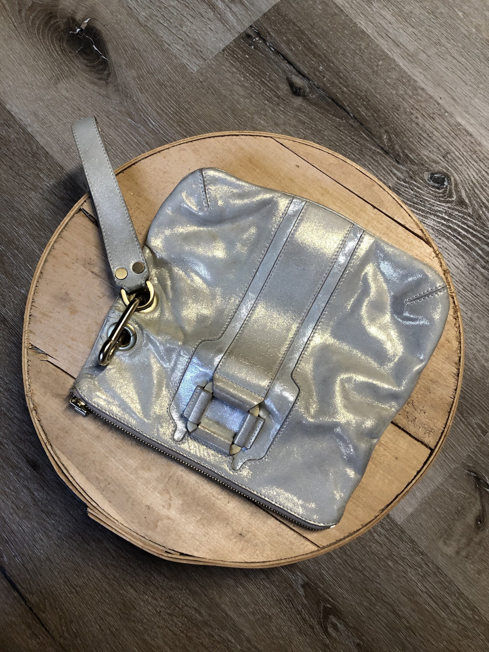 Kingspier Vintage - Authentic Jimmy Choo Mave foldover clutch in Iridescent white calfskin leather with gold hardware, suede lining, magnetic snap and zip closures.