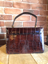 Load image into Gallery viewer, Kingspier Vintage - Bellestone red/brown lizard handbag, circa 1970’s with top handle, leather lining, brass hardware and clasp closure.

