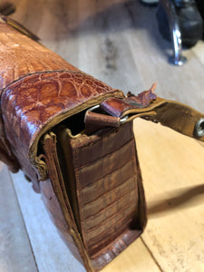 Kingspier Vintage - Rare brown reptile handbag with full alligator body detail, silver hardware, adjustable strap, leather lining and one inside zip pocket.