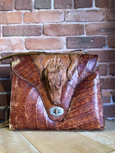 Load image into Gallery viewer, Kingspier Vintage - Rare brown reptile handbag with full alligator body detail, silver hardware, adjustable strap, leather lining and one inside zip pocket.
