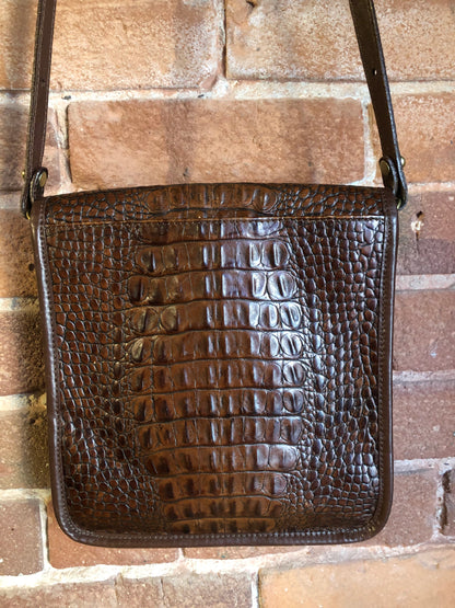 Kingspier Vintage - Brahmin croc-embossed leather crossbody handbag in pecan brown. This bag features brass hardware, snap buckle closure, back pocket and inside zip pocket. Made in the USA.