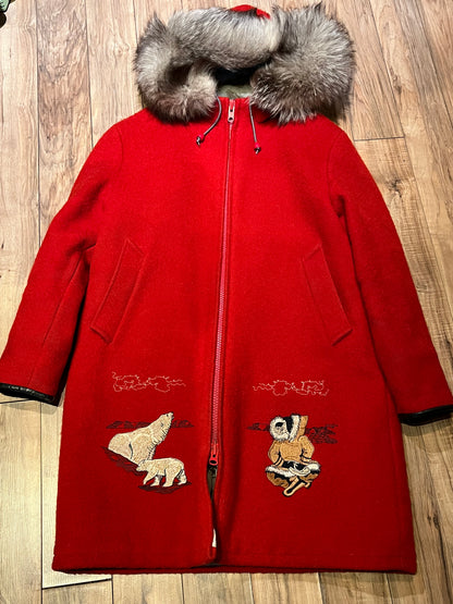 Vintage Central Sportswear Co. red 100% pure virgin wool northern parka with zipper closure, handwarmer pockets, quilted lining, fur trimmed hood and embroidered northern life motif.
 
Made in Canada
Size 12