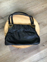 Load image into Gallery viewer, Kingspier Vintage - Jane Shilton black leather handbag with top handle, gold hardware and inside change purse compartment.
