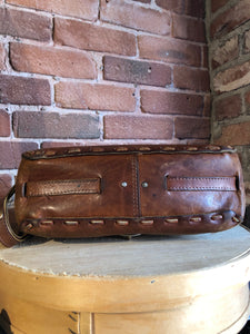 Kingspier Vintage - Hand tooled leather saddle bag with leather stitching, adjustable strap and brass front clasp.