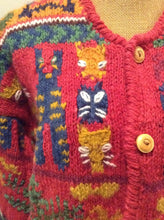 Load image into Gallery viewer, Kingspier Vintage - Express Tricot hand knit wool cardigan with multi coloured cat design, buttons and pockets. Size medium/ large.
