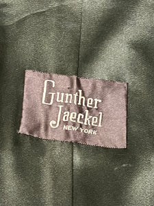 Vintage Gunter Jackal New York fur jacket with hook and eye closures, two front pockets and a “J.C.D” monogram on the inside lining.

Chest 40”