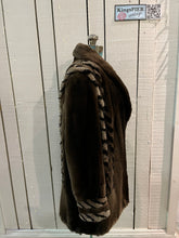 Load image into Gallery viewer, Vintage Eastern Furriers brown fur coat with hook and eye closures and two front pockets.

Although we can’t say for sure what the type of fur is, our educated guess is shorn beaver.

Made in Canada
