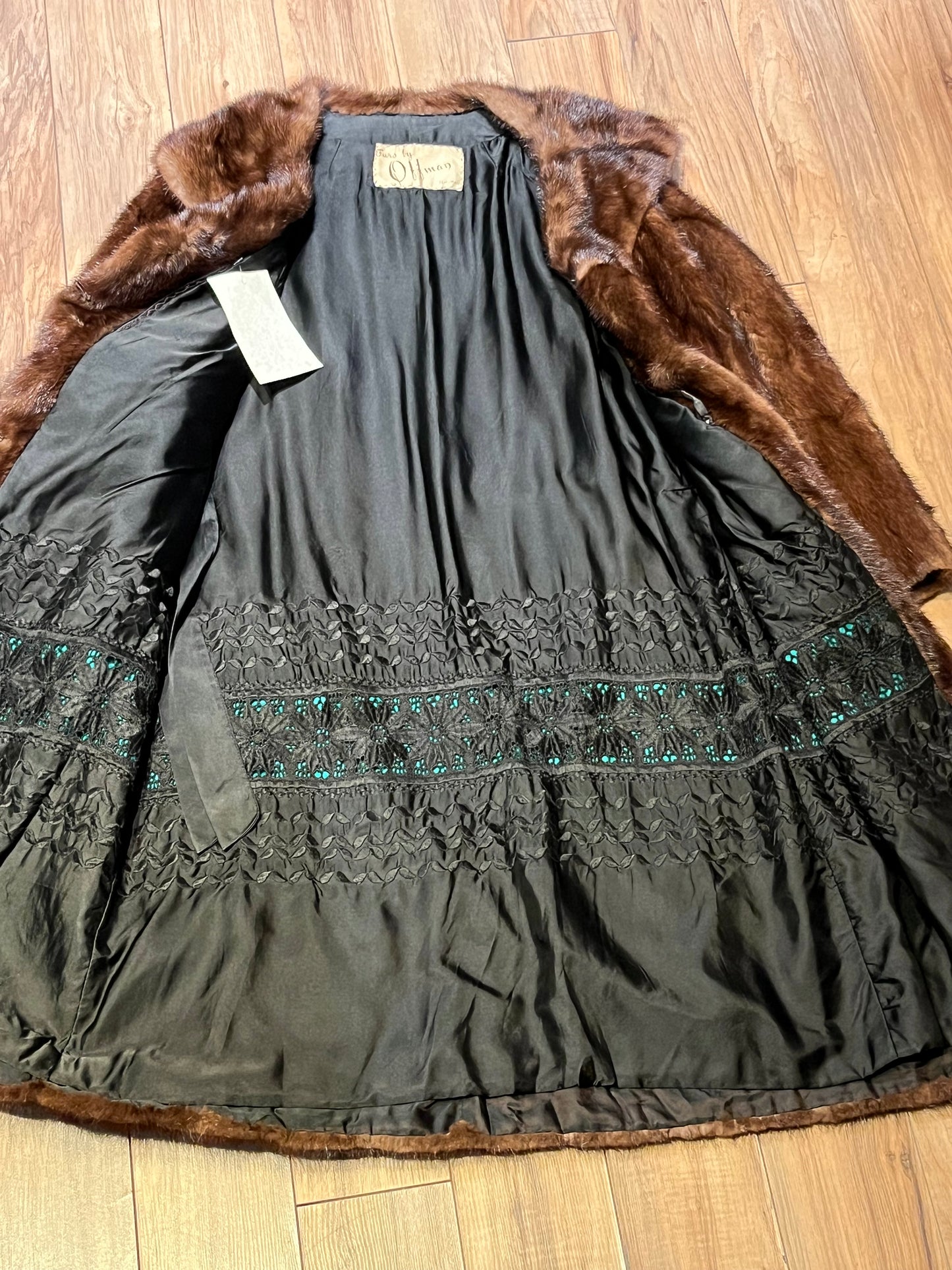 Vintage Furs by Offman brown fur coat with two from pockets, inside pocket, hook and eye closures and a satin lining with lace details.

Made in Canada
Size 10