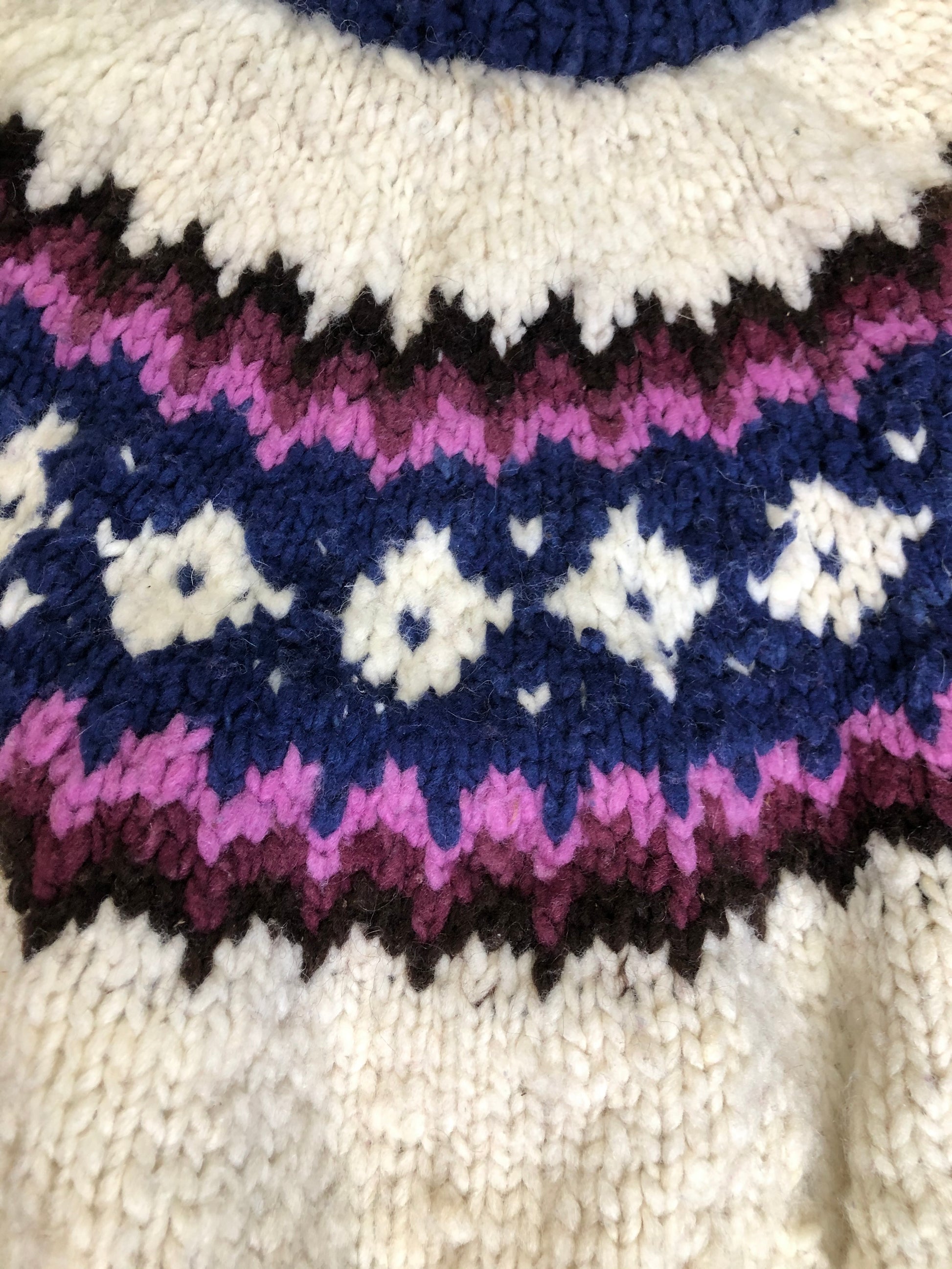 Kingspier Vintage - Vintage Handknit wool lopi sweater with white, navy, purple, pink and black design. Made in Ecuador. Size large. 