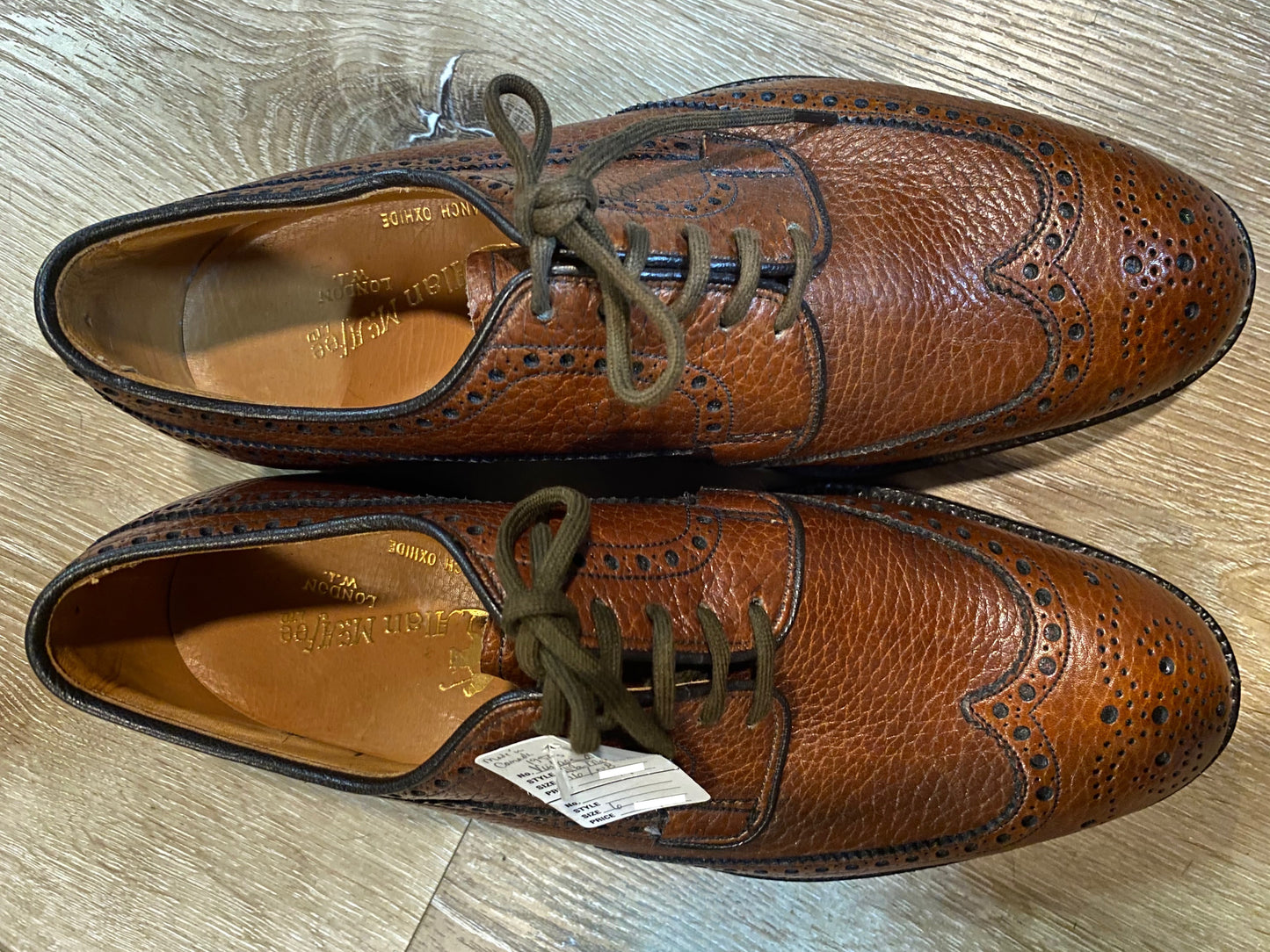 Kingspier Vintage - <p> Brown Ranch Oxhide Leather Full Brogue Wingtip Derbies by Alan McAfee LTD London W.I.</p>
<p>Sizes: 6M 7.5W 38-39EURO</p>
<p>Made in England</p>
<p>Leather Soles</p>
<p>McAfees Rubbertip Heels</p>
<p>Original Style Information and Sizing Handwritten on Inside</p>