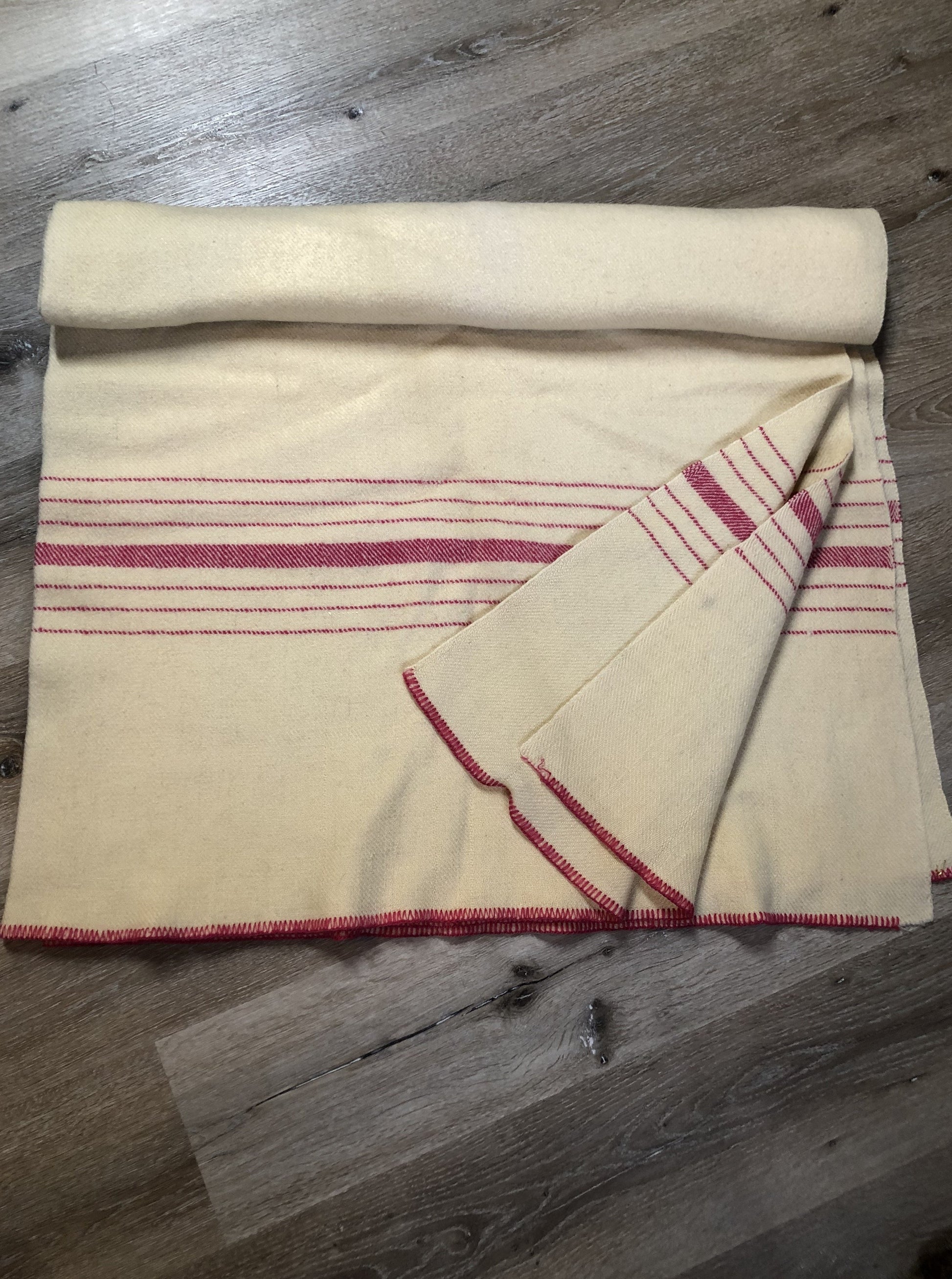 Kingspier Vintage - Vintage cream 100% wool small blanket or throw with dark pink stripe at both ends.