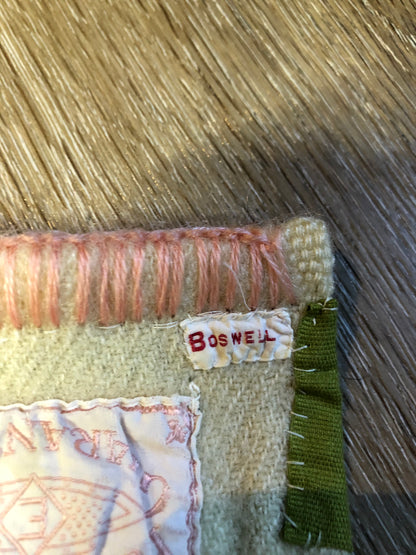 Kingspier Vintage - Vintage Boswell beige and pink stripe wool lap blanket with green reinforcement on the back of the ribbon.