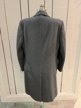 Load image into Gallery viewer, Vintage Moores wool blend long grey coat (65% wool/ 15% cashmere/ 15% polyester/ 5% other) with button closures, two front pockets and two inside pockets.

Made in Canada
Chest 42”
