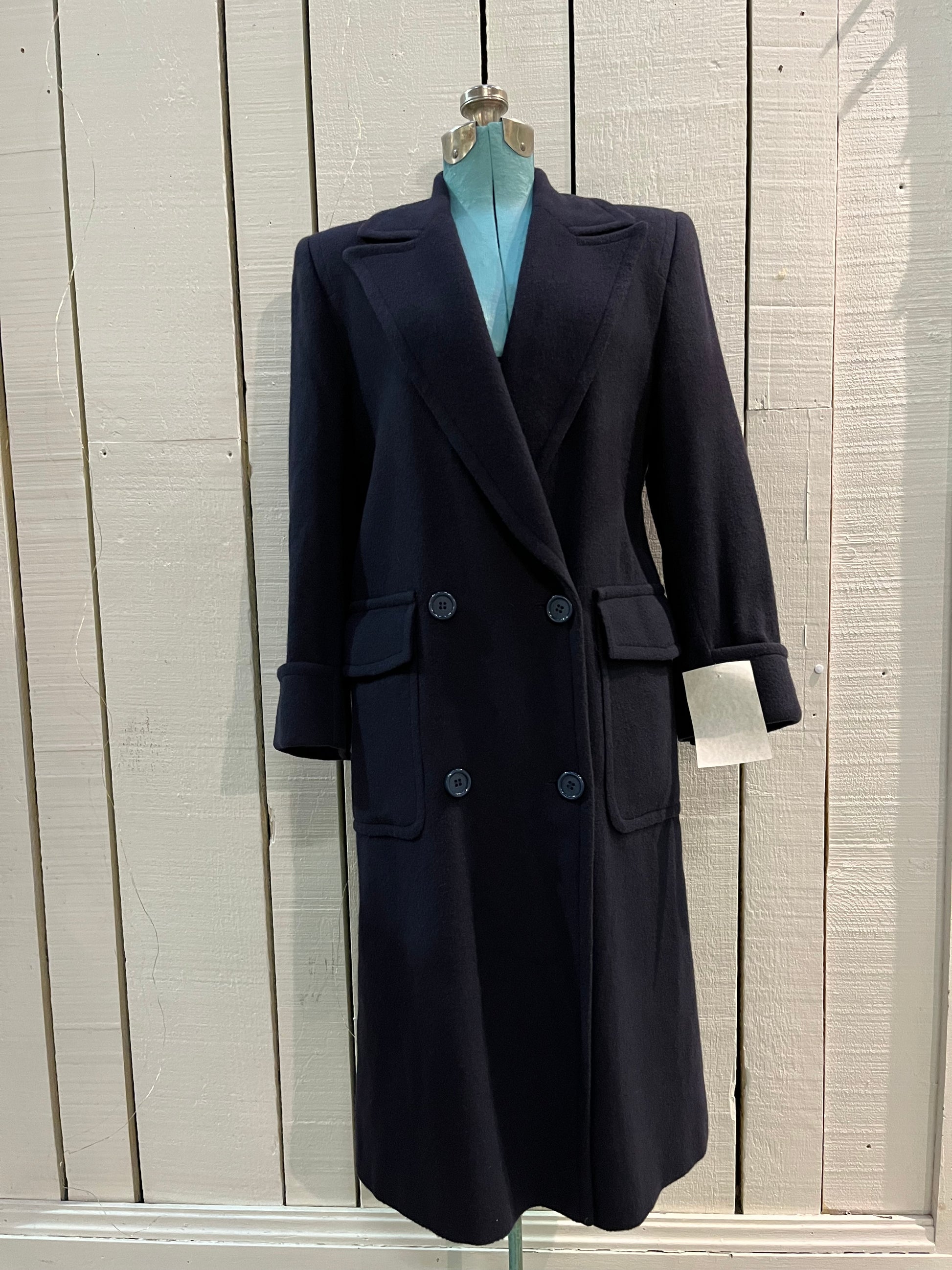 Vintage Fleurette of California from Nordstrom navy double breasted 100% camel hair coat with flap pockets.

Union Made in USA
Chest 41”