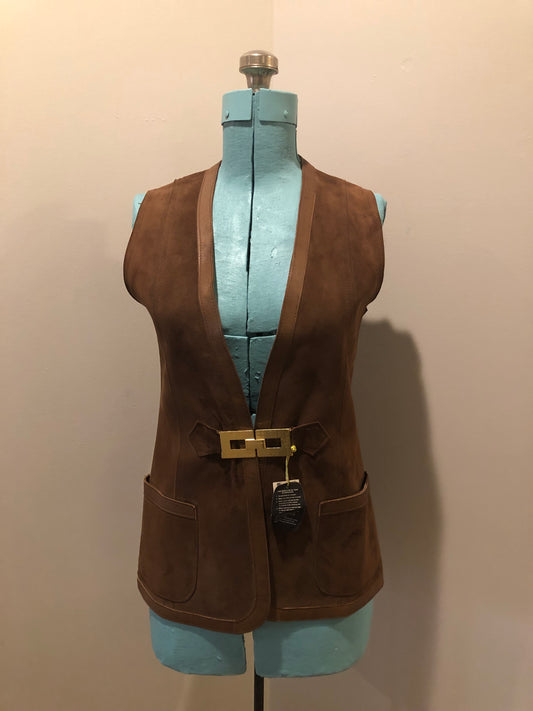 Vintage Mills Brothers deadstock 1960’s brown suede vest with large gold geometric front clasp, leather lining and trim and two patch pockets in the front. Suede and leather are buttery soft. Made in England - Kingspier Vintage