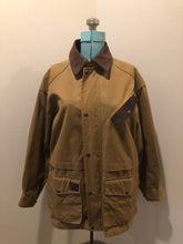 Load image into Gallery viewer, Vintage Australian Outback Collection Oilskin chore jacket with snap and zipper closure, flap pockets, wax cotton shell, plaid lining and leather trim. NWOT. Made in Canada - Kingspier Vintage
