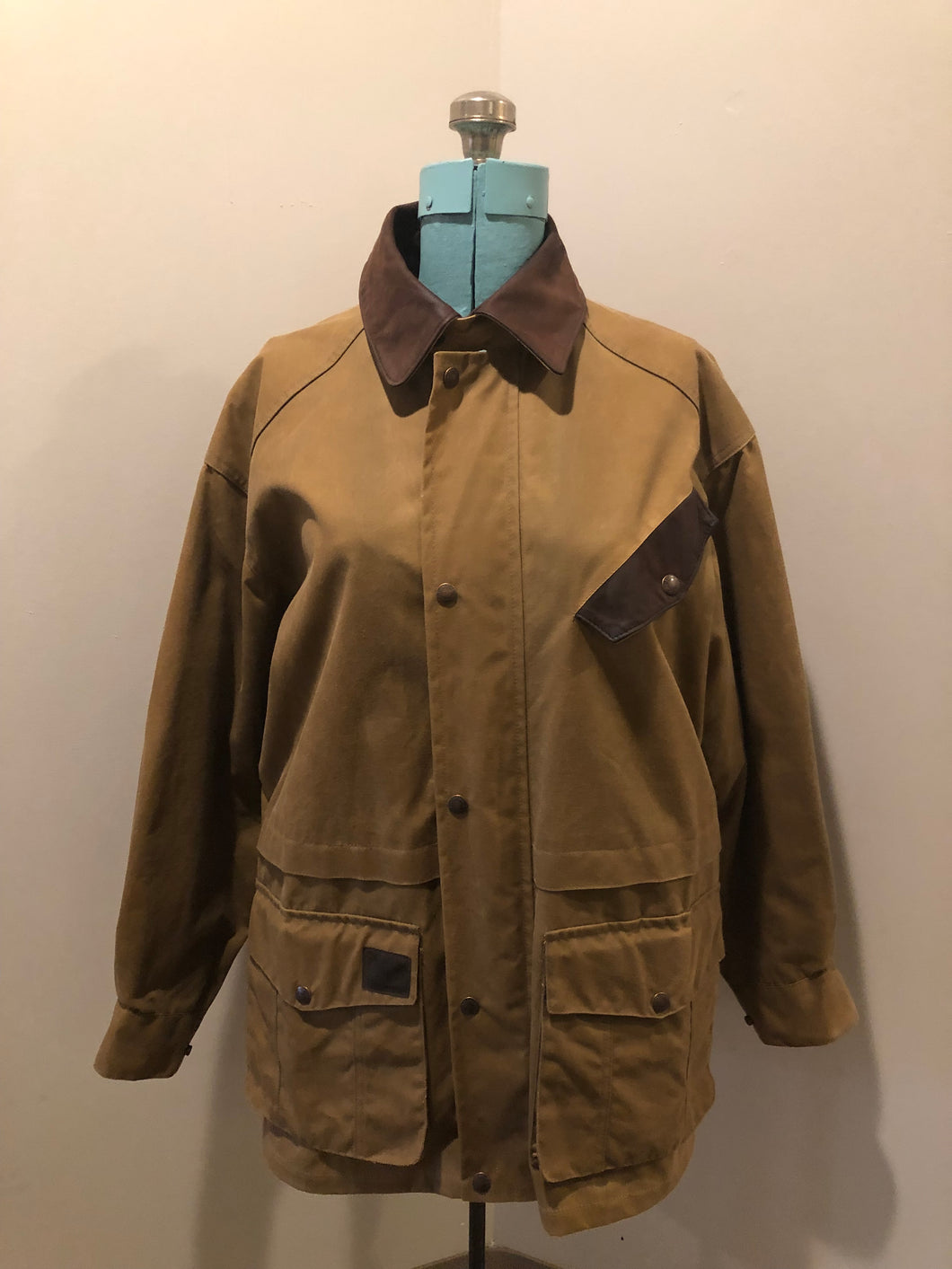 Vintage Australian Outback Collection Oilskin chore jacket with snap and zipper closure, flap pockets, wax cotton shell, plaid lining and leather trim. NWOT. Made in Canada - Kingspier Vintage