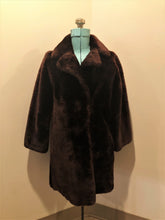 Load image into Gallery viewer, Vintage Martins of London “Glamar” weatherproofed lambs fur in dark brown with satin lining, hook and eye clasps and pockets - Kingspier Vintage
