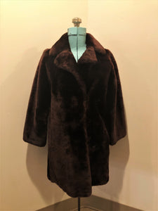 Vintage Martins of London “Glamar” weatherproofed lambs fur in dark brown with satin lining, hook and eye clasps and pockets - Kingspier Vintage