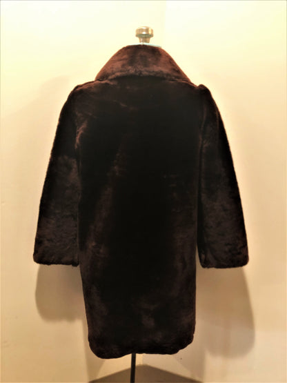 Vintage Martins of London “Glamar” weatherproofed lambs fur in dark brown with satin lining, hook and eye clasps and pockets - Kingspier Vintage