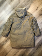 Load image into Gallery viewer, Kingspier Vintage - Richlu down-filled parka in beige with zipper and button closures, fox fur trimmed hood for exceptionally cold conditions. This parka has leather reinforcement details, two flap pockets and two hand warmer pockets with knit inside cuffs and inside drawstring. Made in Winnipeg, Canada. Size large.
