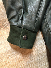 Load image into Gallery viewer, Kingspier Vintage - Bainton green leather jacket with green suede details, zipper and snap closures, slash pockets and black lining. Made in Canada. Size large.
