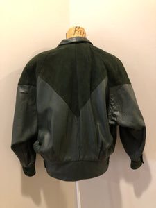 Kingspier Vintage - Bainton green leather jacket with green suede details, zipper and snap closures, slash pockets and black lining. Made in Canada. Size large.