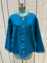 Load image into Gallery viewer, Vintage Cousin Smoothy’s Canadiana Teal Cardigan with Tyrol Anno Domini 1809 military button closures (The Tyrolean Rebellion of 1809) and embroidered detail trim.

Made in Canada
Size Medium
