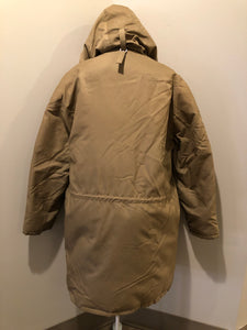 Kingspier Vintage - Richlu down-filled parka in beige with zipper and button closures, fox fur trimmed hood for exceptionally cold conditions. This parka has leather reinforcement details, two flap pockets and two hand warmer pockets with knit inside cuffs and inside drawstring. Made in Winnipeg, Canada. Size large.