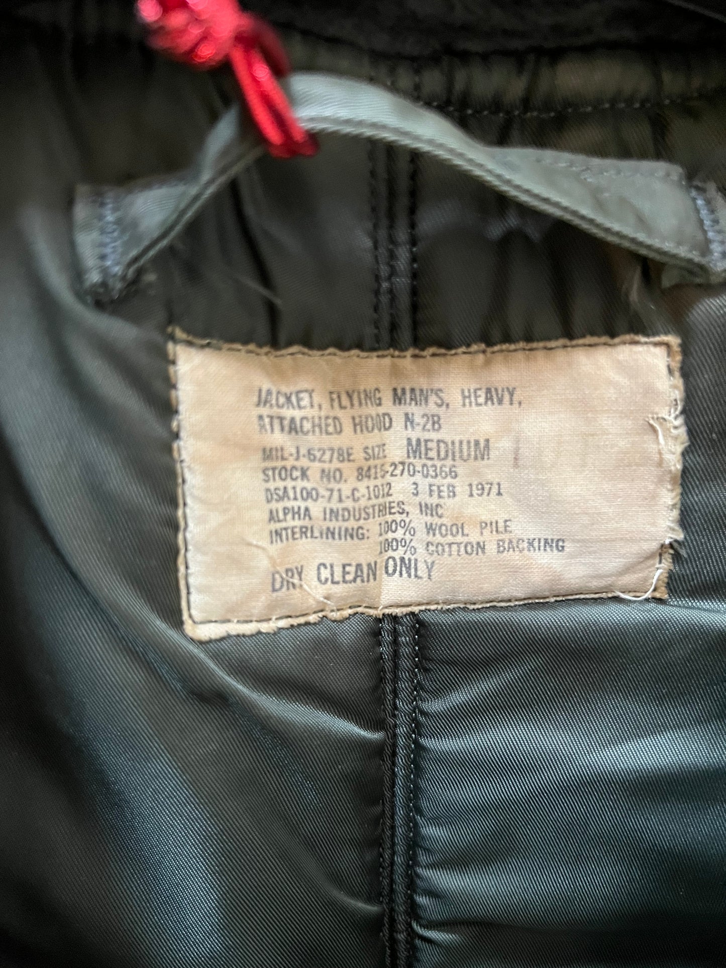 Very Rare Vintage circa 1971 USAF flying man’s, heavy pilot’s jacket, DSA100-71-C-1012, made by Alpha Industries with fur trimmed snorkel hood, zipper and button closures, 100% wool pile lining, multiple pockets and US Air Force emblem.

Made in USA
Size Medium