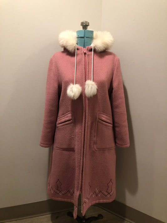 Vintage Hudson’s Bay Company pink 100% virgin wool parka with white fur trimmed hood, fur pom poms, zipper closure, patch pockets, satin lining and embroidered pattern along the hem. Made in Canada. Size 14 - Kingspier Vintage