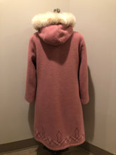 Load image into Gallery viewer, Vintage Hudson’s Bay Company pink 100% virgin wool parka with white fur trimmed hood, fur pom poms, zipper closure, patch pockets, satin lining and embroidered pattern along the hem. Made in Canada. Size 14 - Kingspier Vintage

