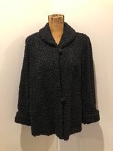 Load image into Gallery viewer, Kingspier Vintage - Vintage Rideau Furs black persian wool coat with wool buttons, pockets and black satin lining with delicate flower motif. Made in Nova Scotia. Size small/ medium.
