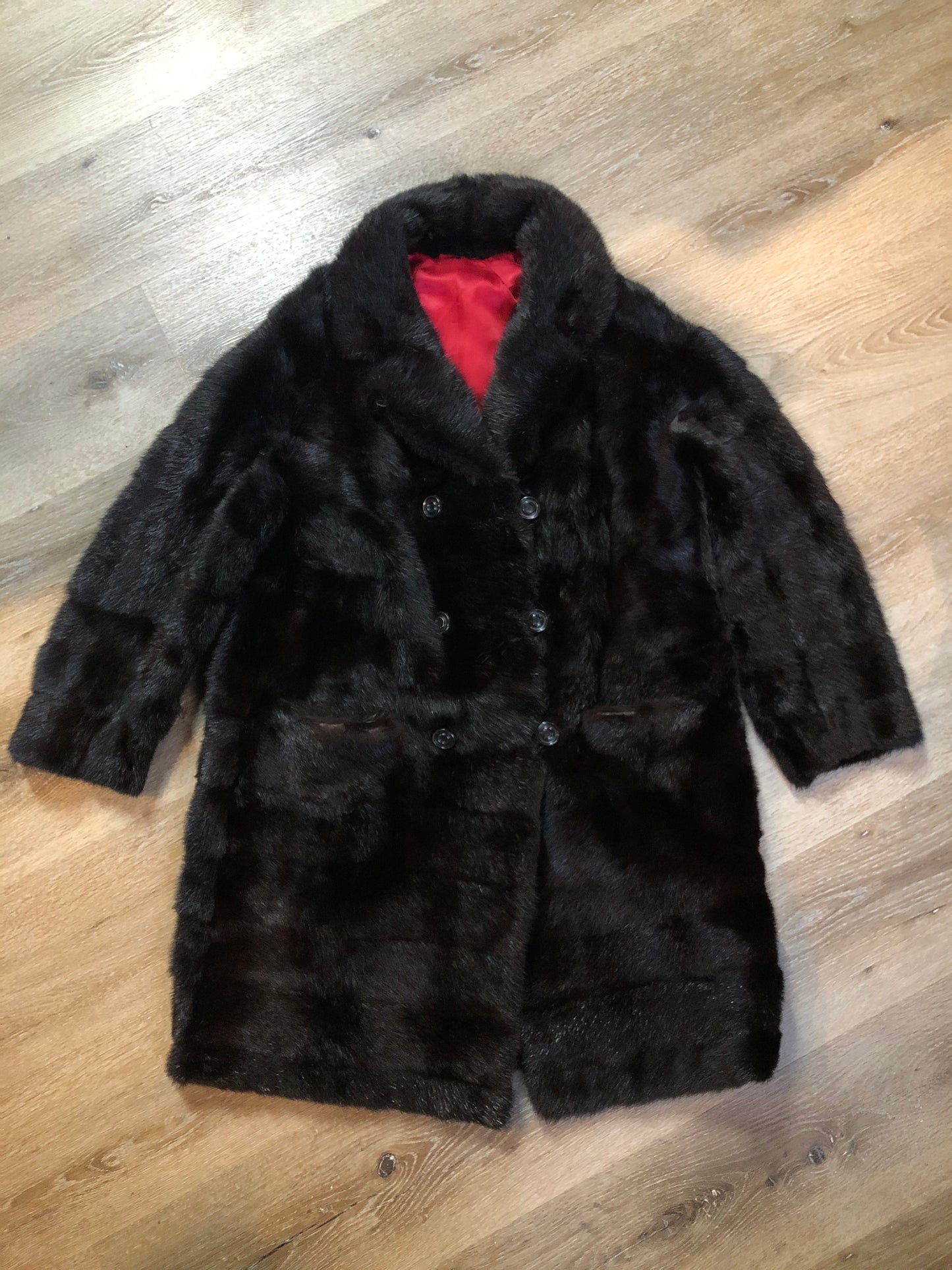 Kingspier Vintage - Vintage dark brown double breasted fur coat with red lining, button closures, pockets and on inside pocket. Fur type unknown. Size small.