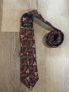 Kingspier Vintage - Gentry tie in red, white and black pattern. Fibres unknown. 

Length: 55.5” 
Width: 2.5” 

This tie is in excellent condition.
