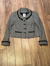 Load image into Gallery viewer, Vintage Maria Grazia Seven wool black and white houndstooth jacket with unique button closures, slight shoulder padding and two front patch pockets.

Made in Italy
Tag reads size 46
