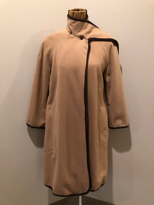 Kingspier Vintage - Handmade camel coloured cashmere cape with sleeves, attached scarf, patch pockets, two button closure at the collar and a full lining.