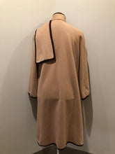 Load image into Gallery viewer, Kingspier Vintage - Handmade camel coloured cashmere cape with sleeves, attached scarf, patch pockets, two button closure at the collar and a full lining.
