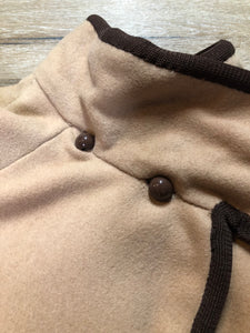 Kingspier Vintage - Handmade camel coloured cashmere cape with sleeves, attached scarf, patch pockets, two button closure at the collar and a full lining.