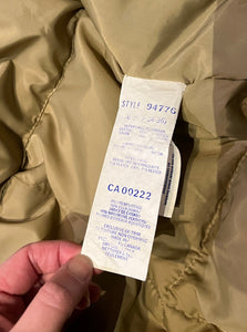 Vintage Sears “The Mens Store” beige down-filled parka (60% duck down/ 40% waterfowl feather) with cotton/nylon blend shell, zipper and button closures, two hand-warmer pockets, two flap pockets, two inside zip pockets, hood with fur trim and storm cuffs.

Made in Canada
Size Small 34-36