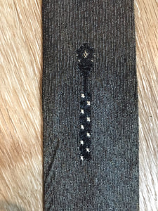 Kingspier Vintage - Abbey tie with grey, black and white pattern. Fibres unknown.

Length: 56” 
Width: 2.25” 

This tie is in excellent condition with some yellowing/ sun damage.