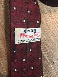 Kingspier Vintage - Gentry 100% Terylene tie with burgundy, white and black pattern.

Length: 56” 
Width: 2.25” 

This tie is in excellent condition.