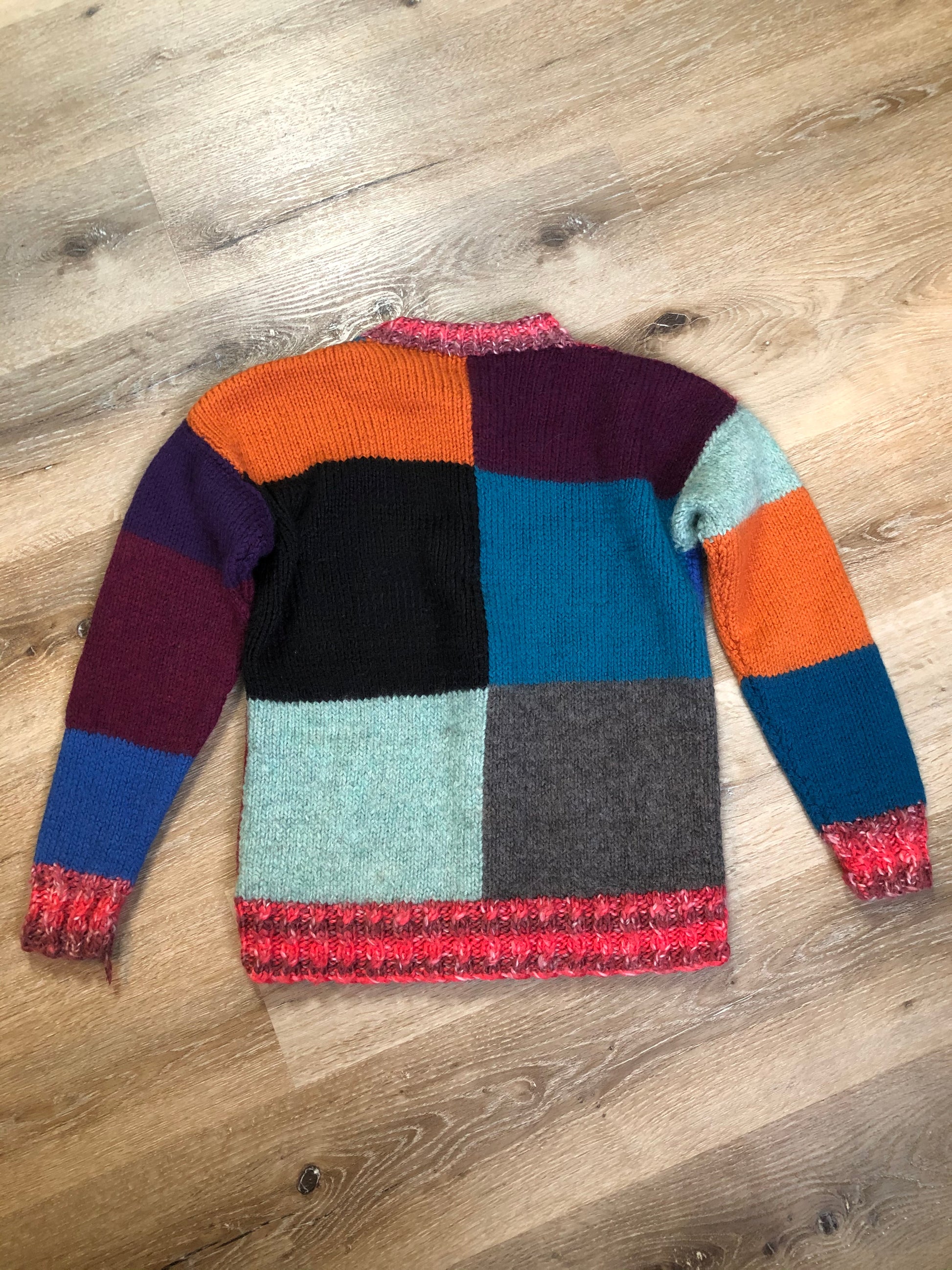 Kingspier Vintage - Hand knit Multi-Coloured patch work cardigan with button closures and pockets Made in Nova Scotia, Canada. Fibres unknown
