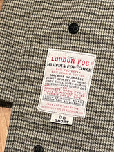 Load image into Gallery viewer, Vintage London Fog grey houndstooth maincoat with a 50% polyester/ 50% cotton shell, removable 100% acrylic pile lining, zipper closure and two front pockets.

Made in USA
Size 38 Short
