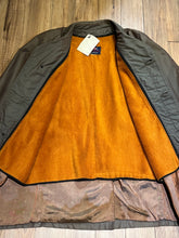 Load image into Gallery viewer, Vintage Centennial Sportswear toupe trench coat with removable orange lining, button closures and two front pockets.

Made in Canada
Chest 46”
