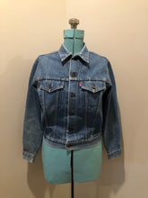 Load image into Gallery viewer, Vintage 1970’s Levi’s medium wash denim trucker jacket with button closures and two flap pockets on the chest.  Red Tab, 100% cotton, made in USA, size 18 - Kingspier Vintage
